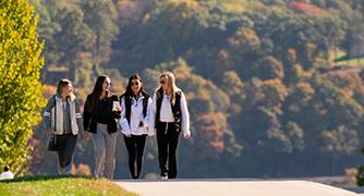 An image of people walking on campus. 